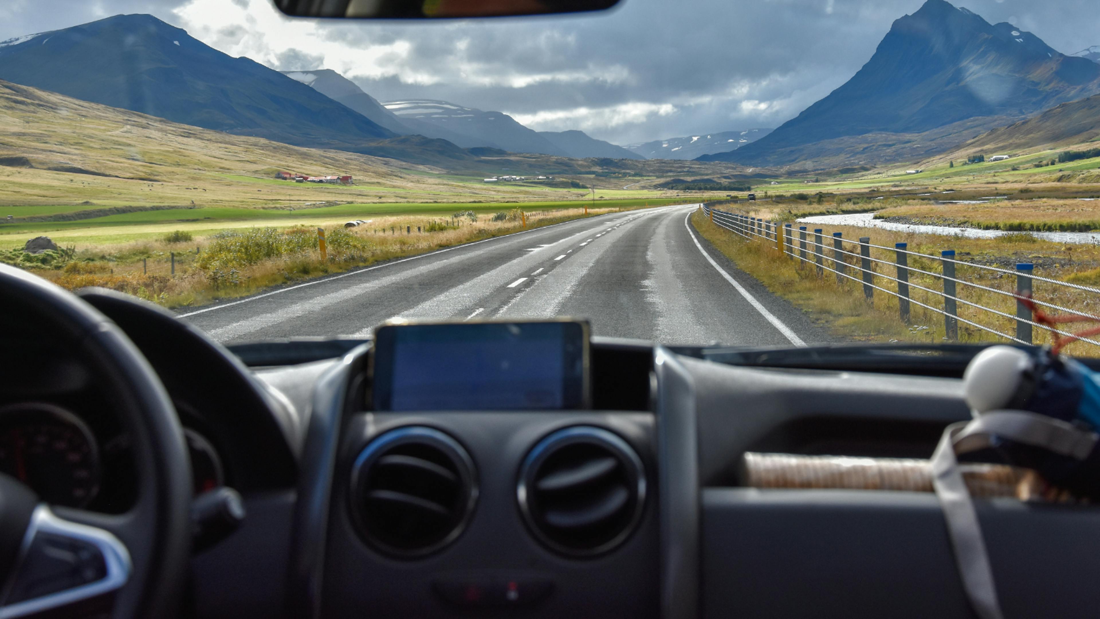 Driving a rental car through Iceland.