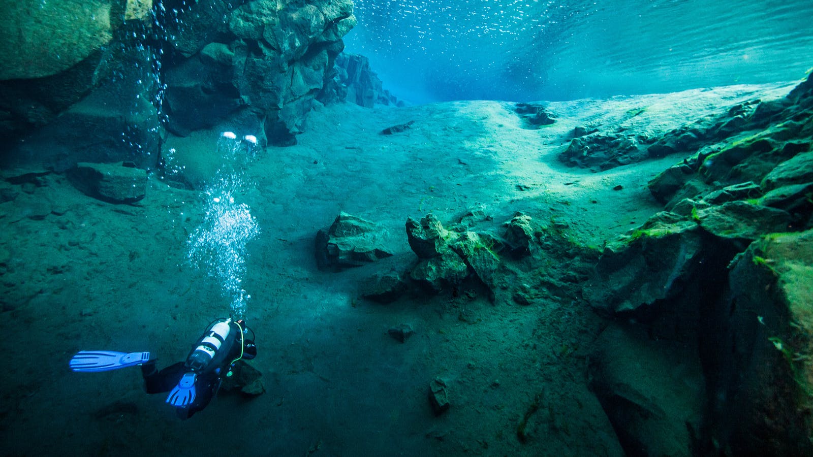 The clear water between the two tectonic plates at Silfra Fissure.