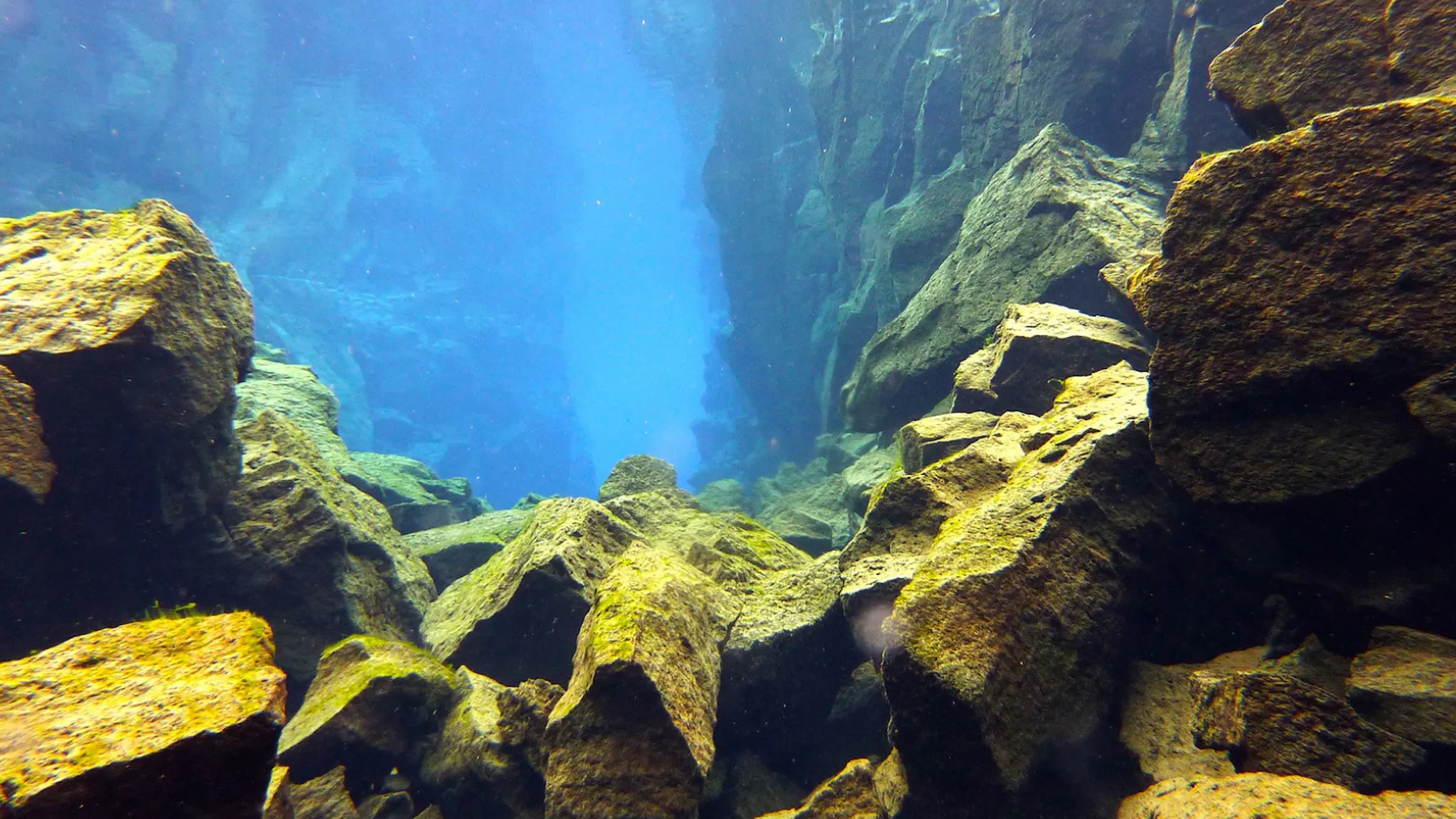 The clear water between the two tectonic plates at Silfra Fissure.