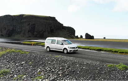 A white camper on an F-road in Iceland