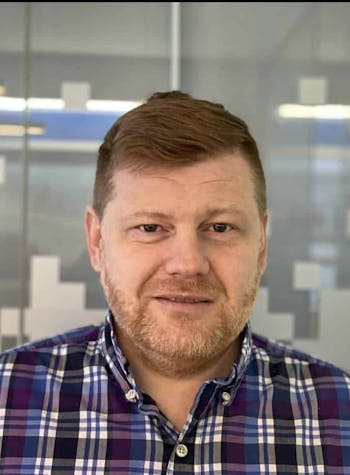 OWNER AND CFO POSIN FOR A PHOTO