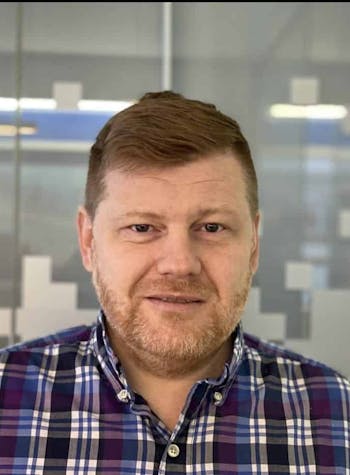 OWNER AND CFO POSIN FOR A PHOTO