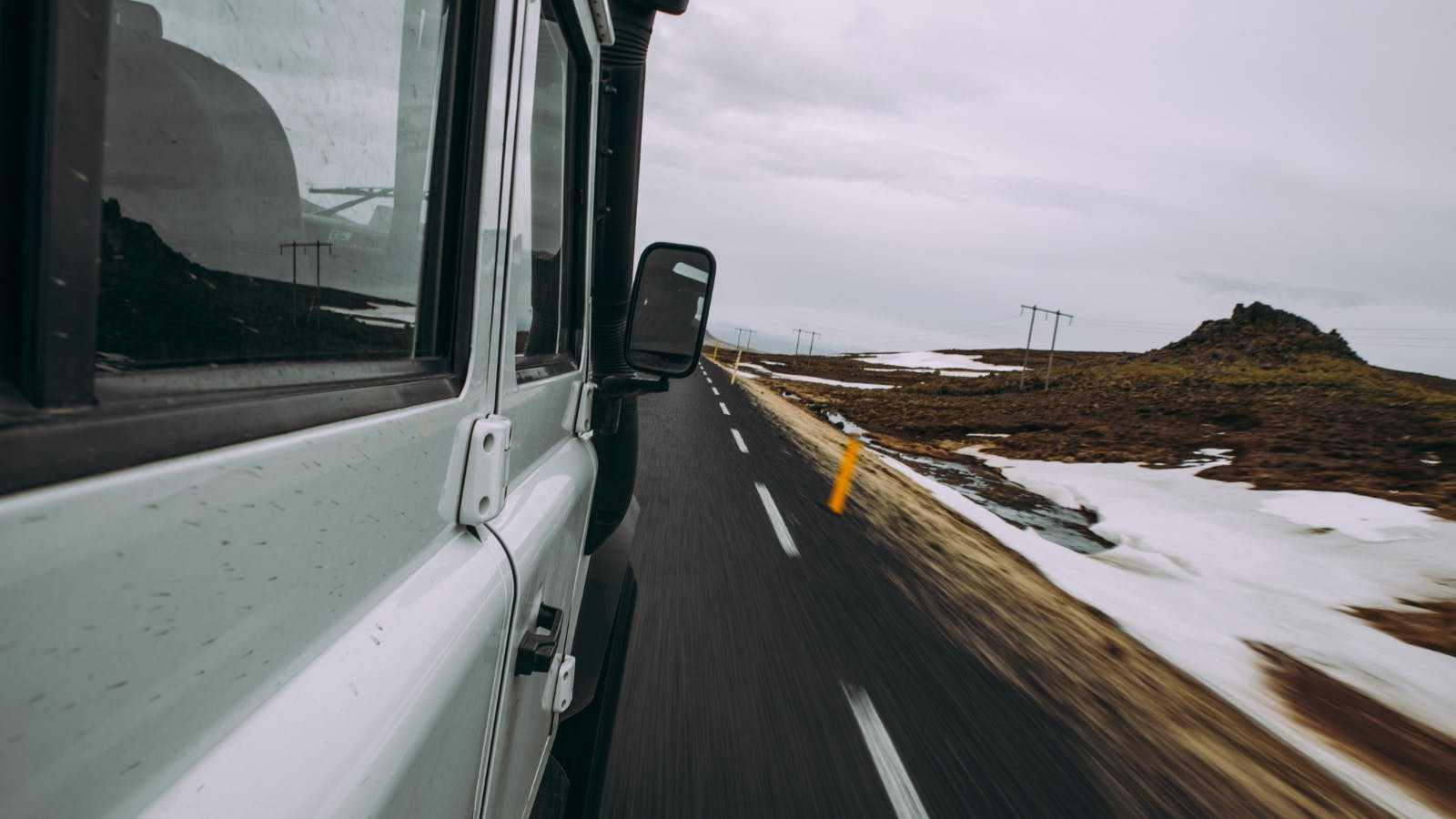 View out of car window onto Icelandic highway