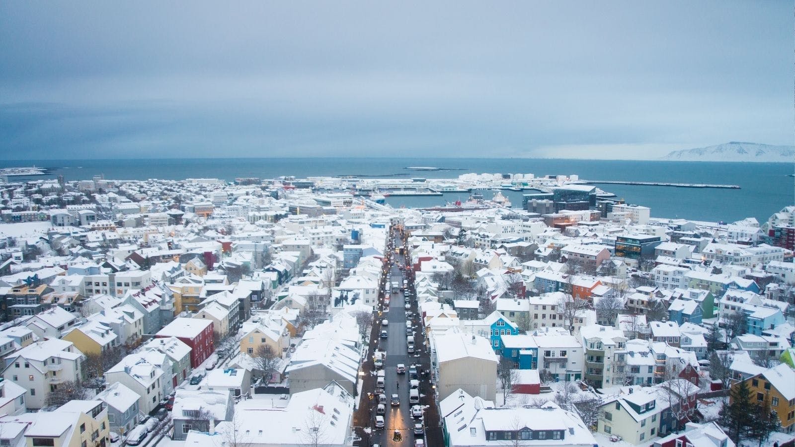 Aerial view of Reykjavík in the snow.