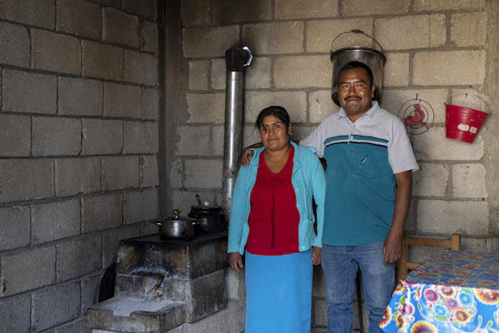 Microsol_Mexico couple beside their cookstove
