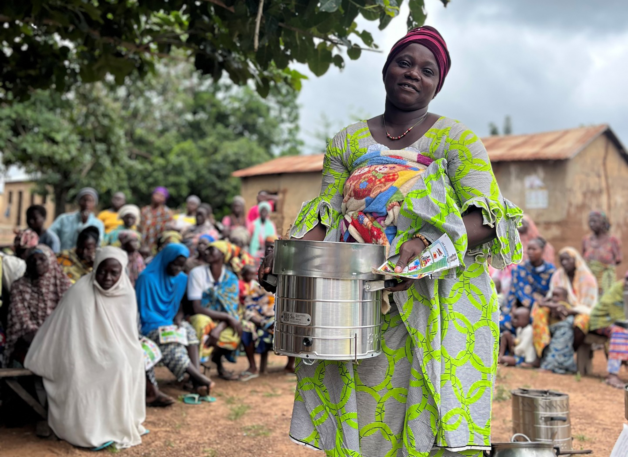 humingbirds BISSAP cover image - women with a new clean cookstove