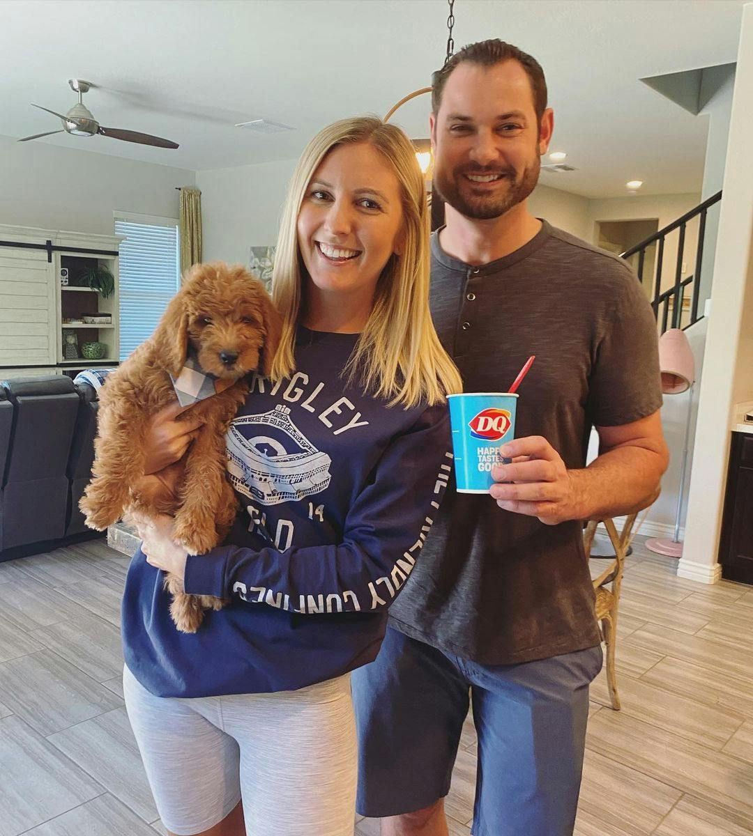 Doodle puppy with humans