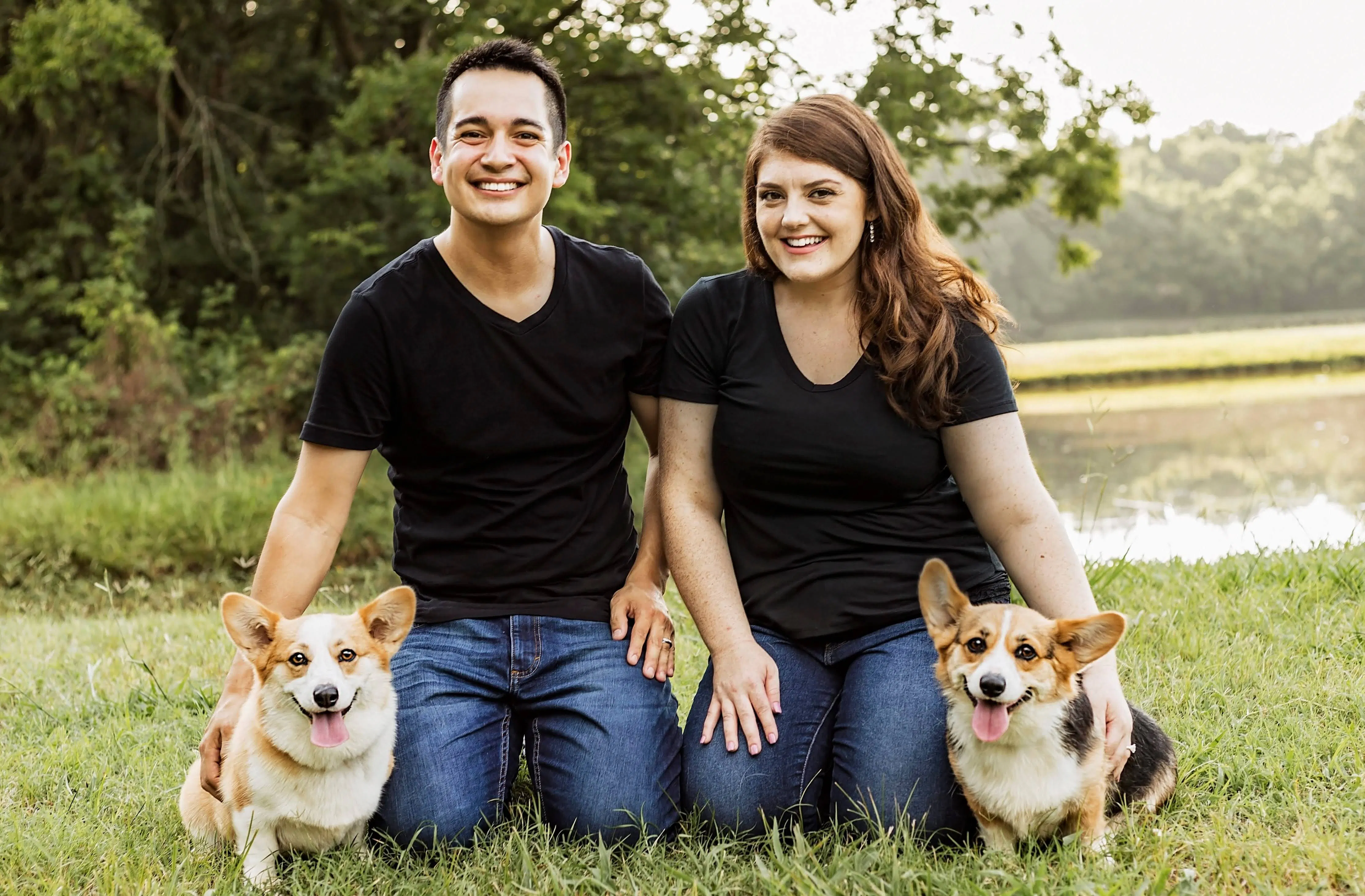 Man and woman with two dogs.
