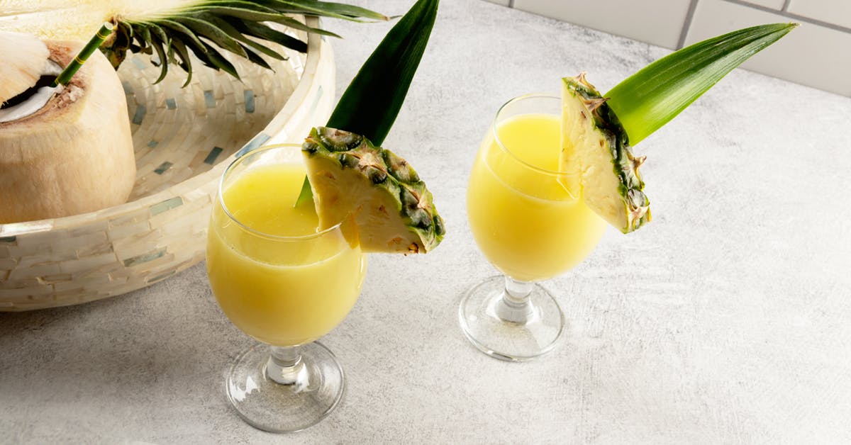 pineapple coconut juice on a table with garnish