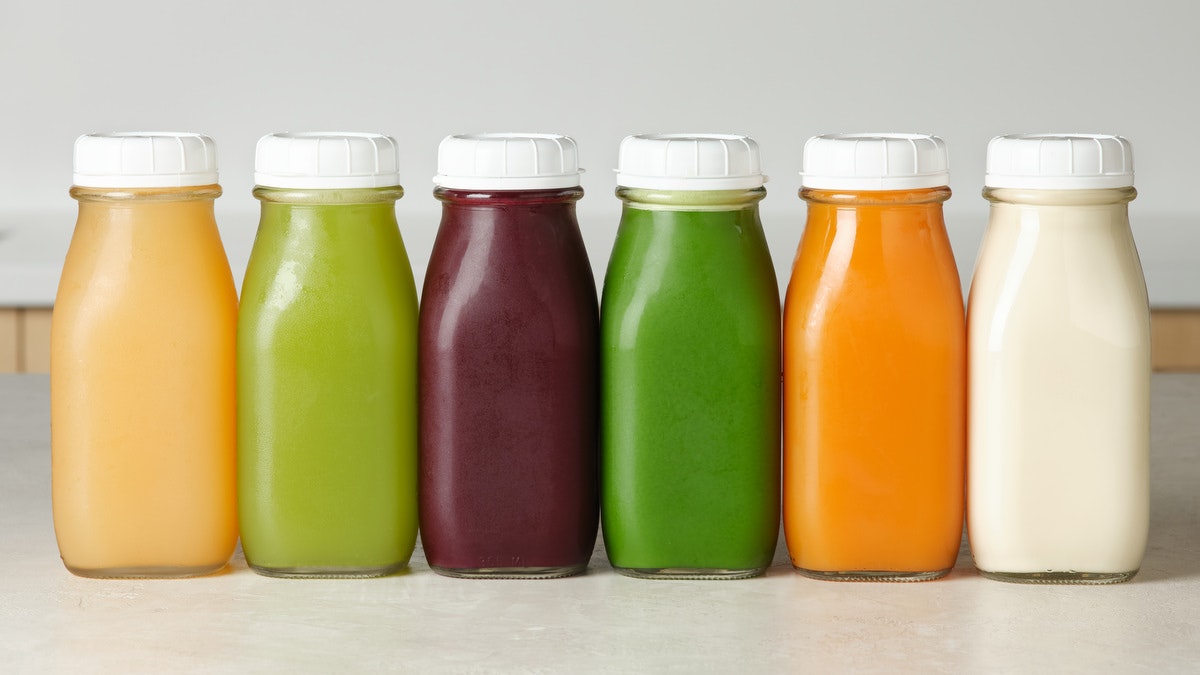 bottles of different types of juice for a juice cleanse