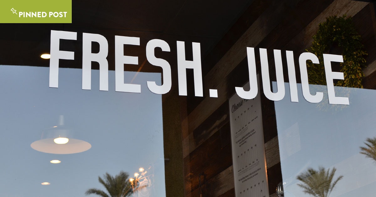 fresh juice message on a juice bar business window