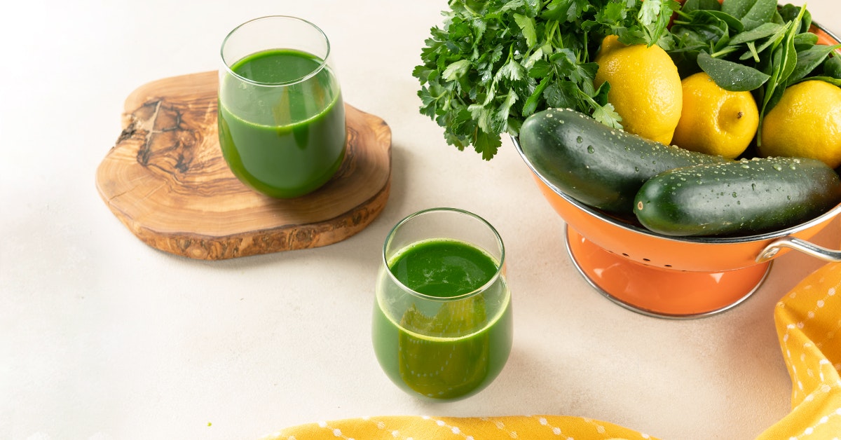 parsley lemon juice recipe for weight loss with ingredients on a white table
