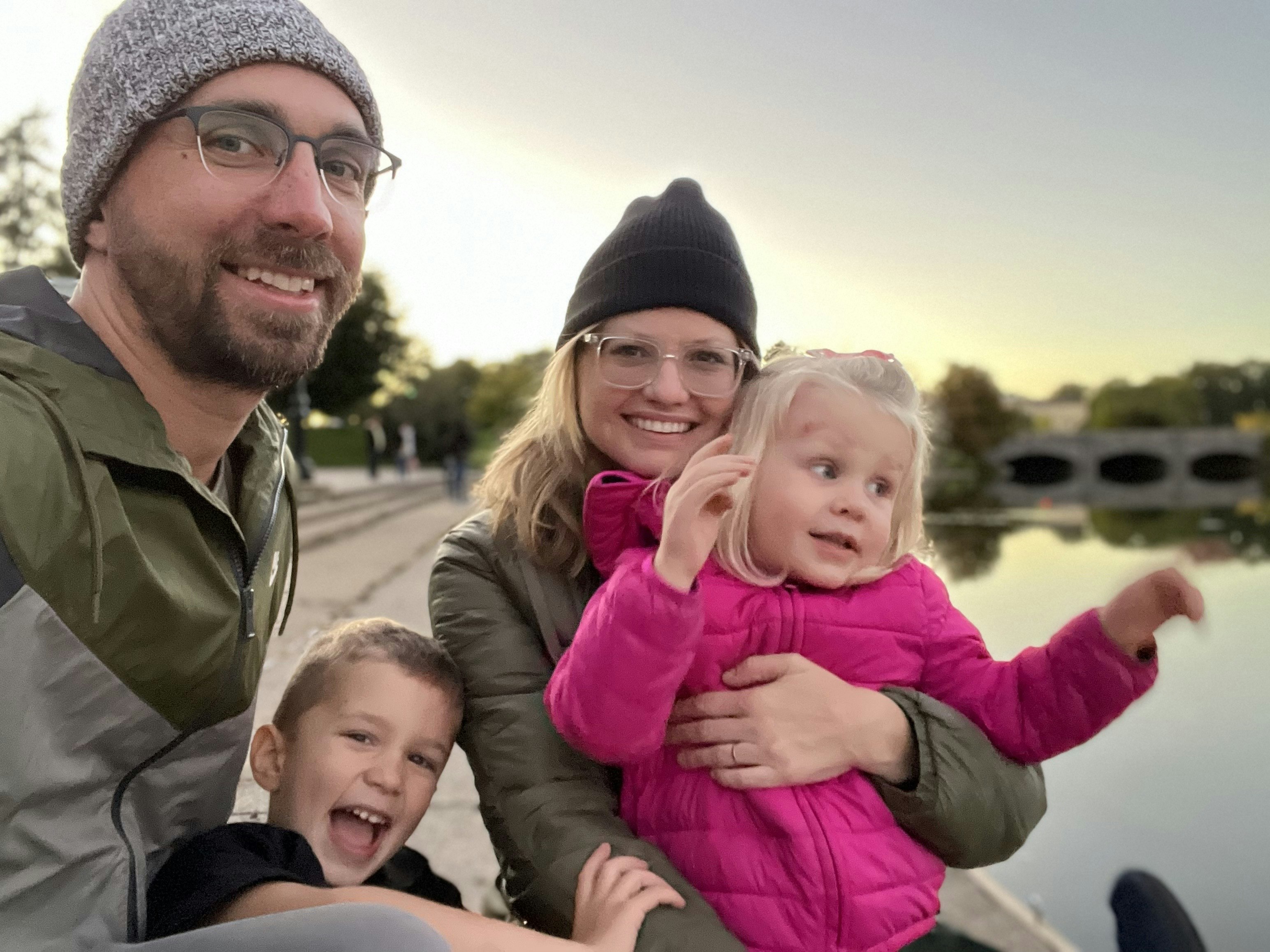 family near water