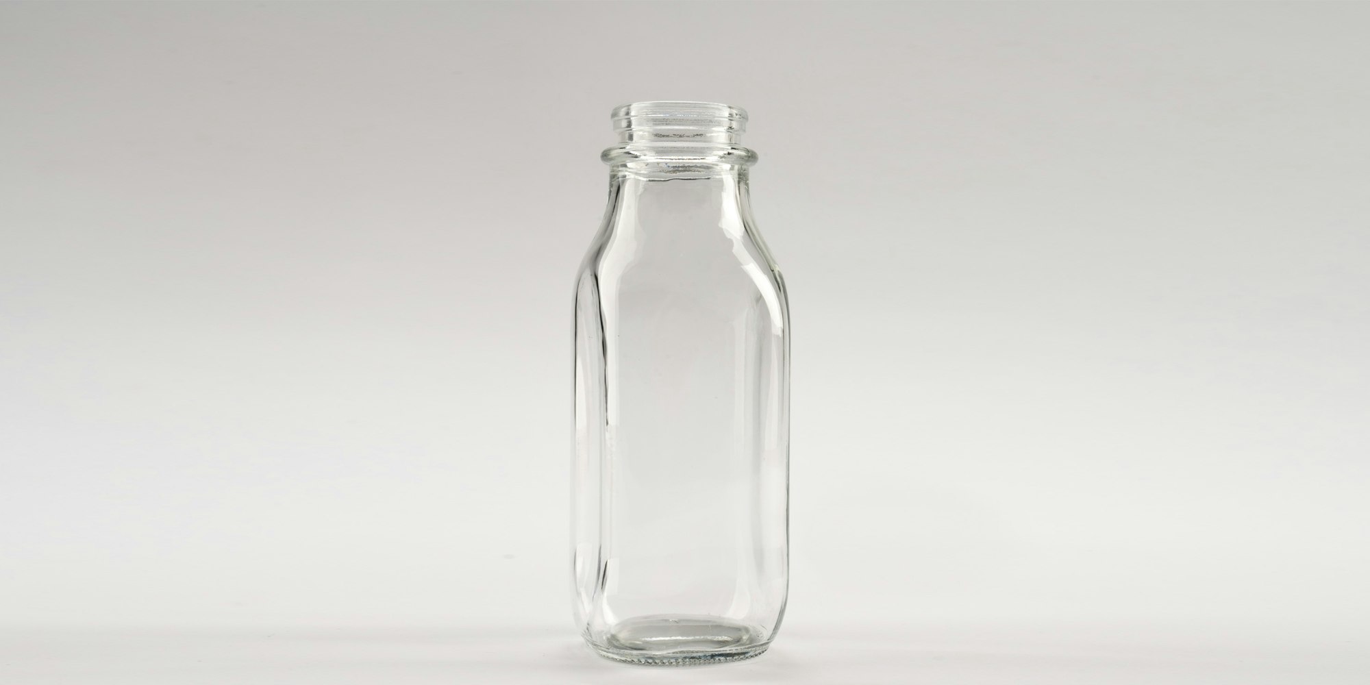 what are glass bottles made from