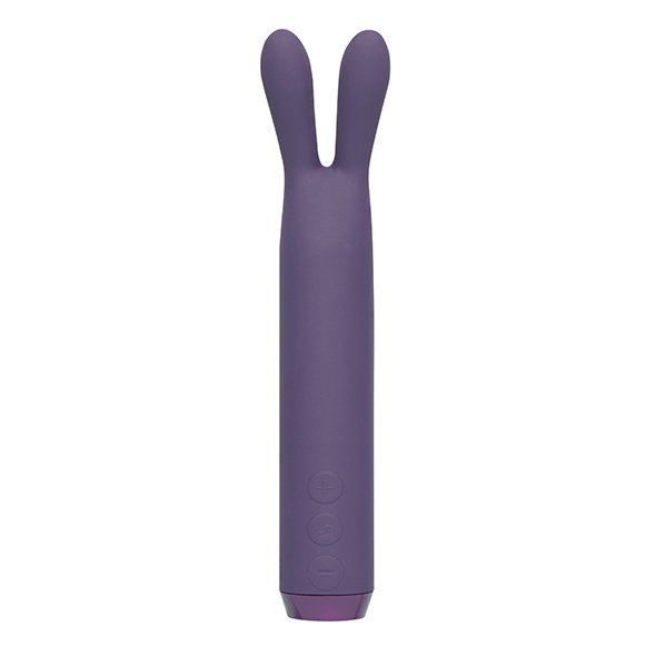 Small purple cylindrical-shaped vibe with two purple 'ears' sticking out the top