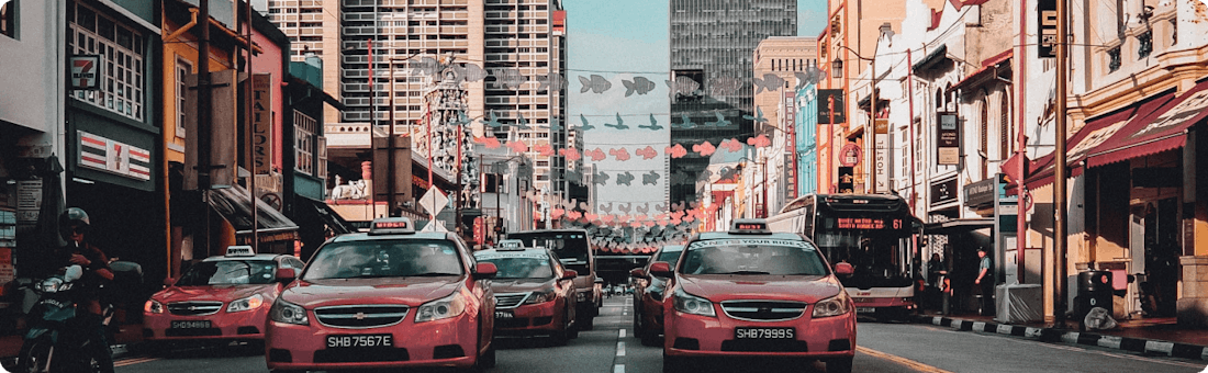 Busy city street with many taxis
