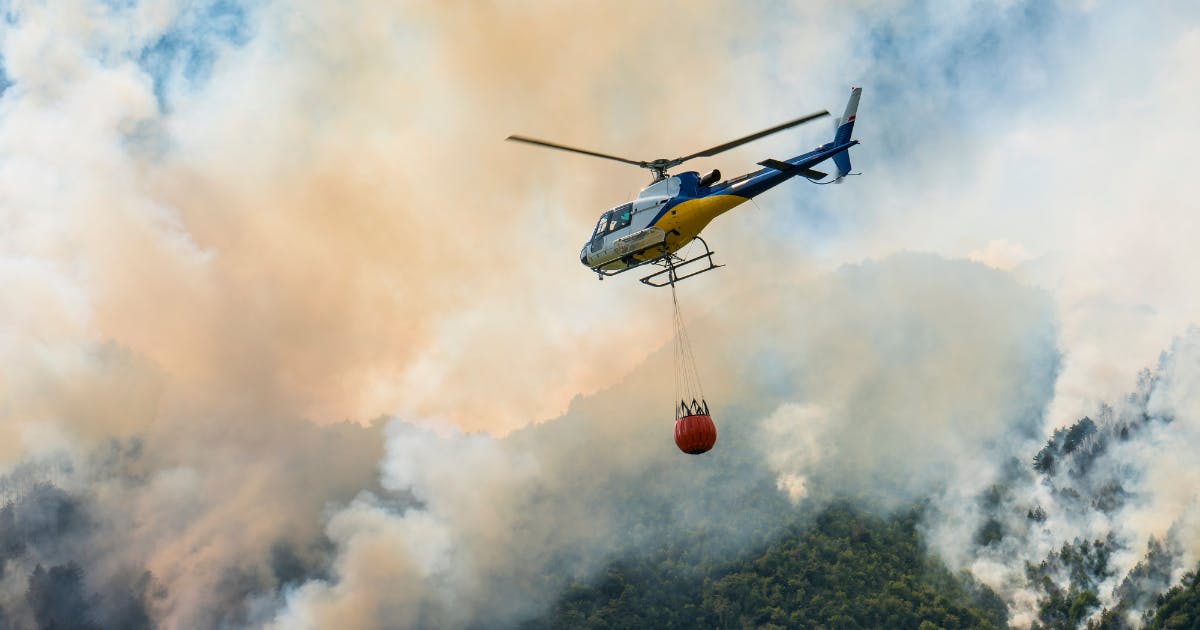 Bambi helicopter transporting water to fight wildfires