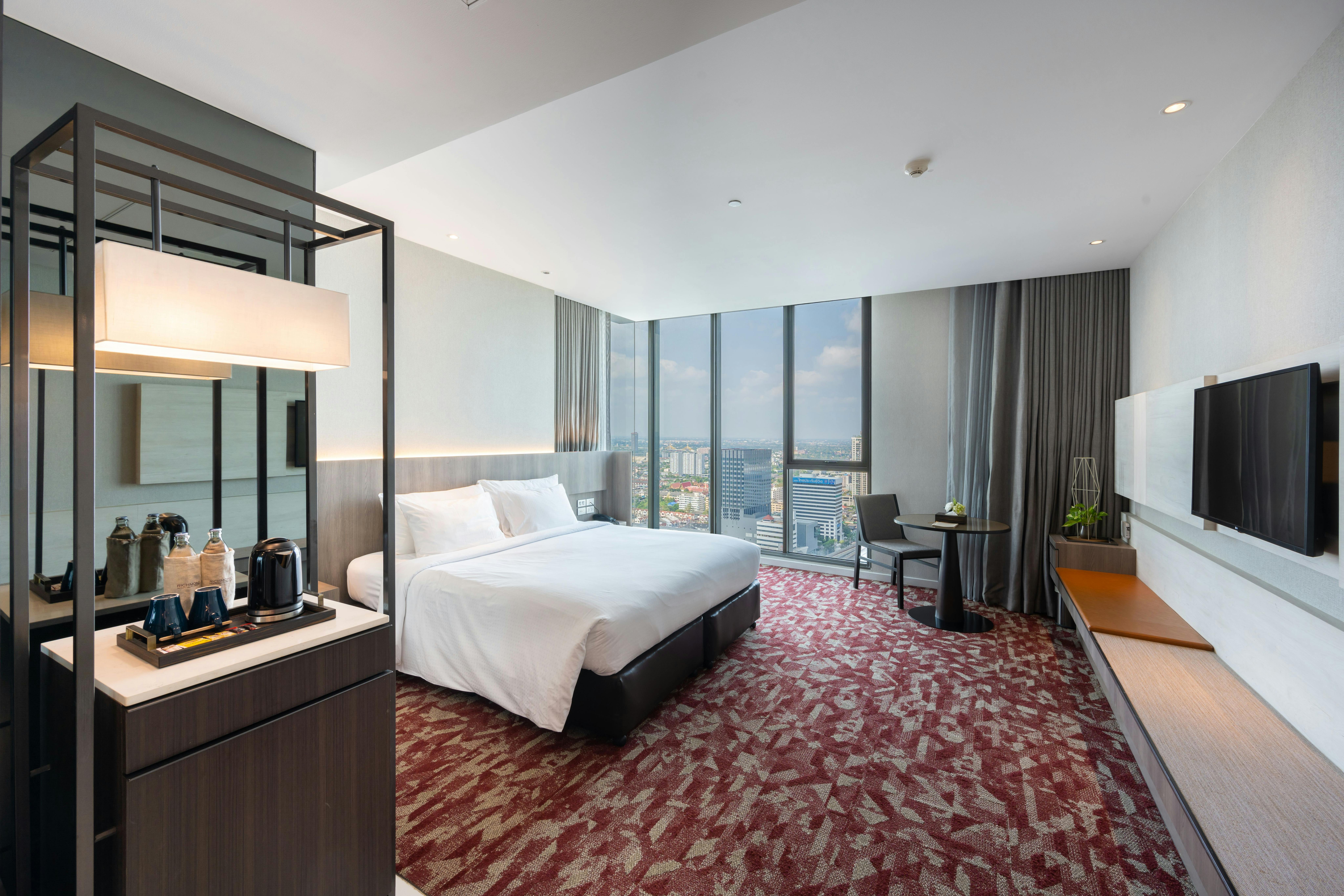 Bottom side view of Grand Deluxe room by showing the city view of Nonthaburi