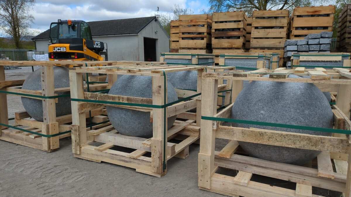 Granite balls on pallets ready to be shipped