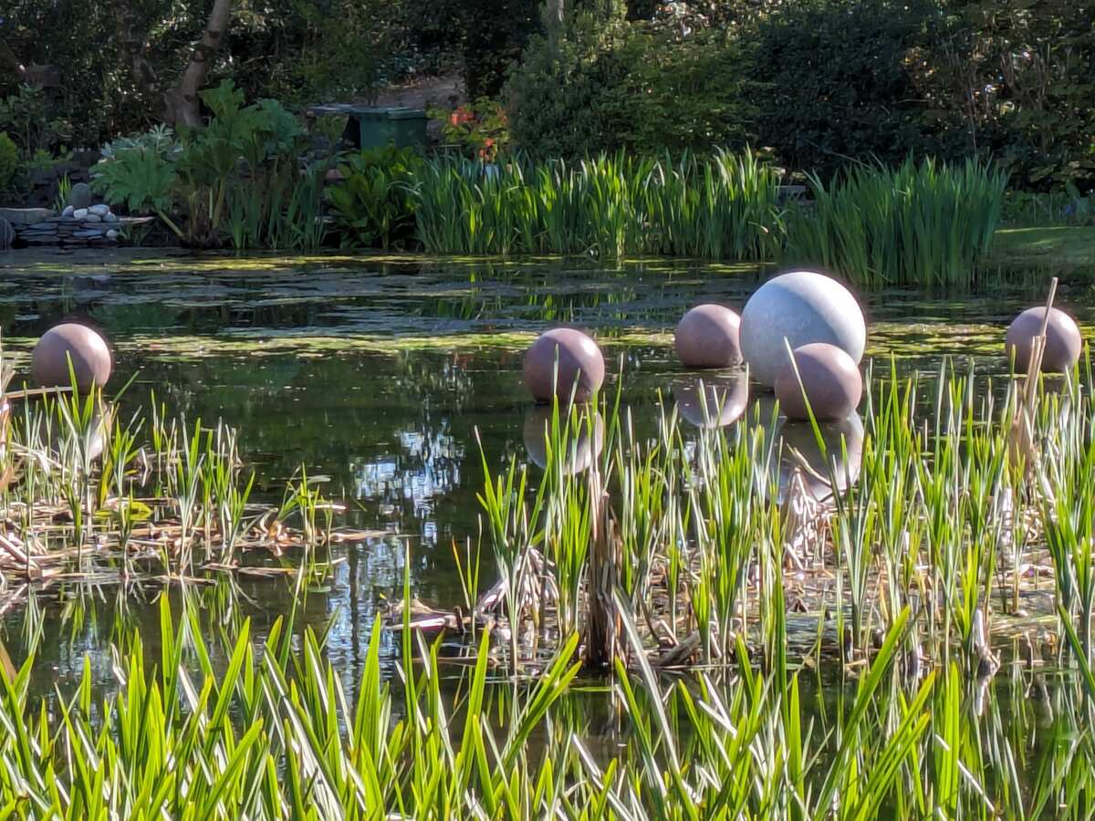 Granite balls on the pond