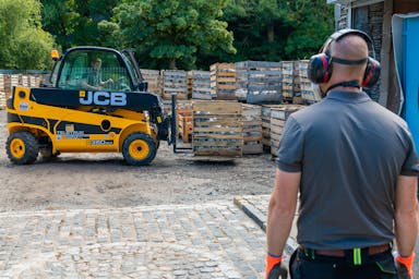 Preparing a crate of granite setts for delivery