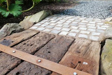 Granite setts used as entry point to a path