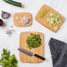 Baccarat cutting boards on bench with a knife