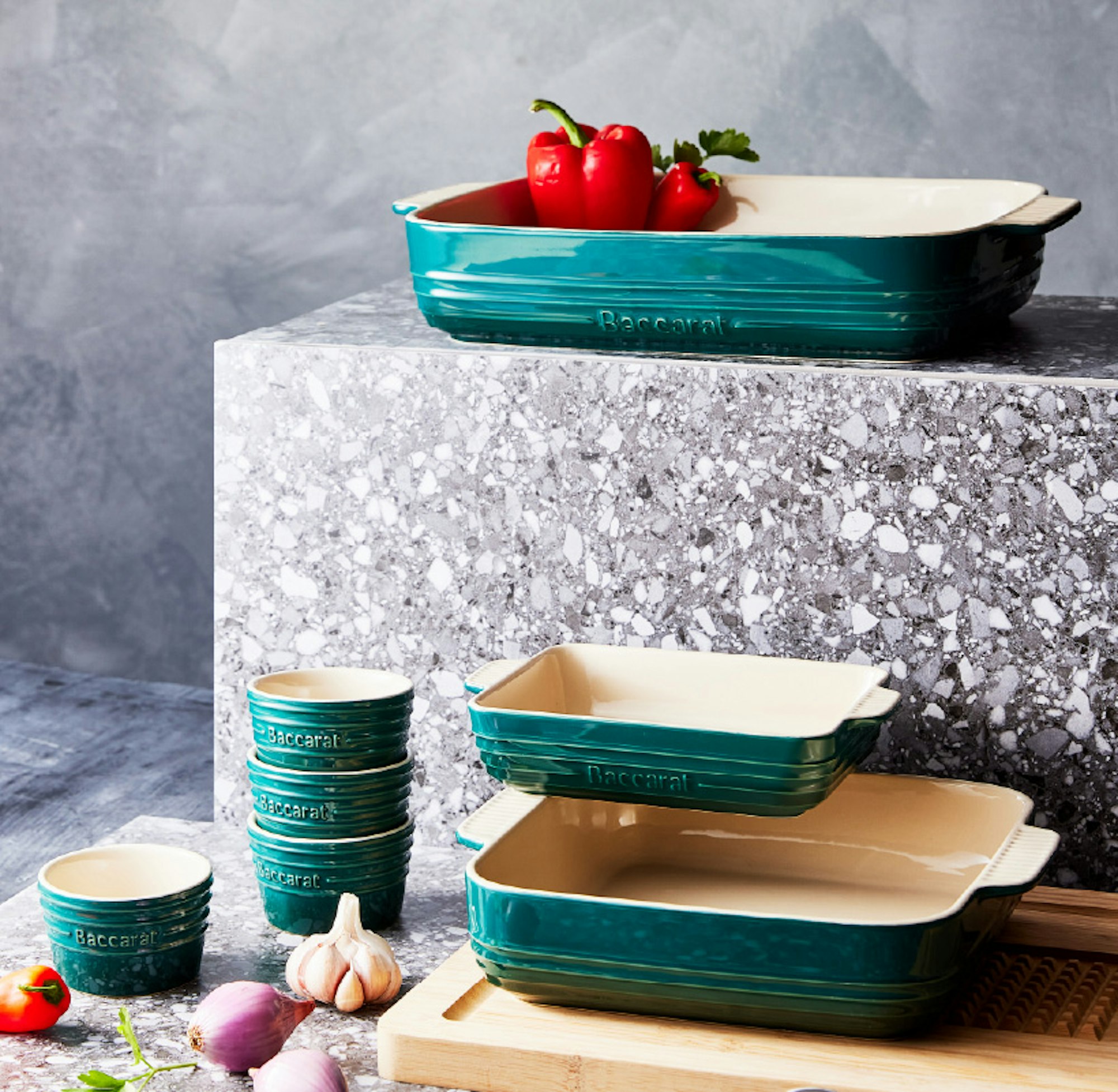 Teal coloured Baccarat Le Connoisseur bakeware range on table