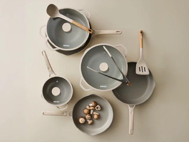 Baccarat NOOK Cream cookware collection on a cream background