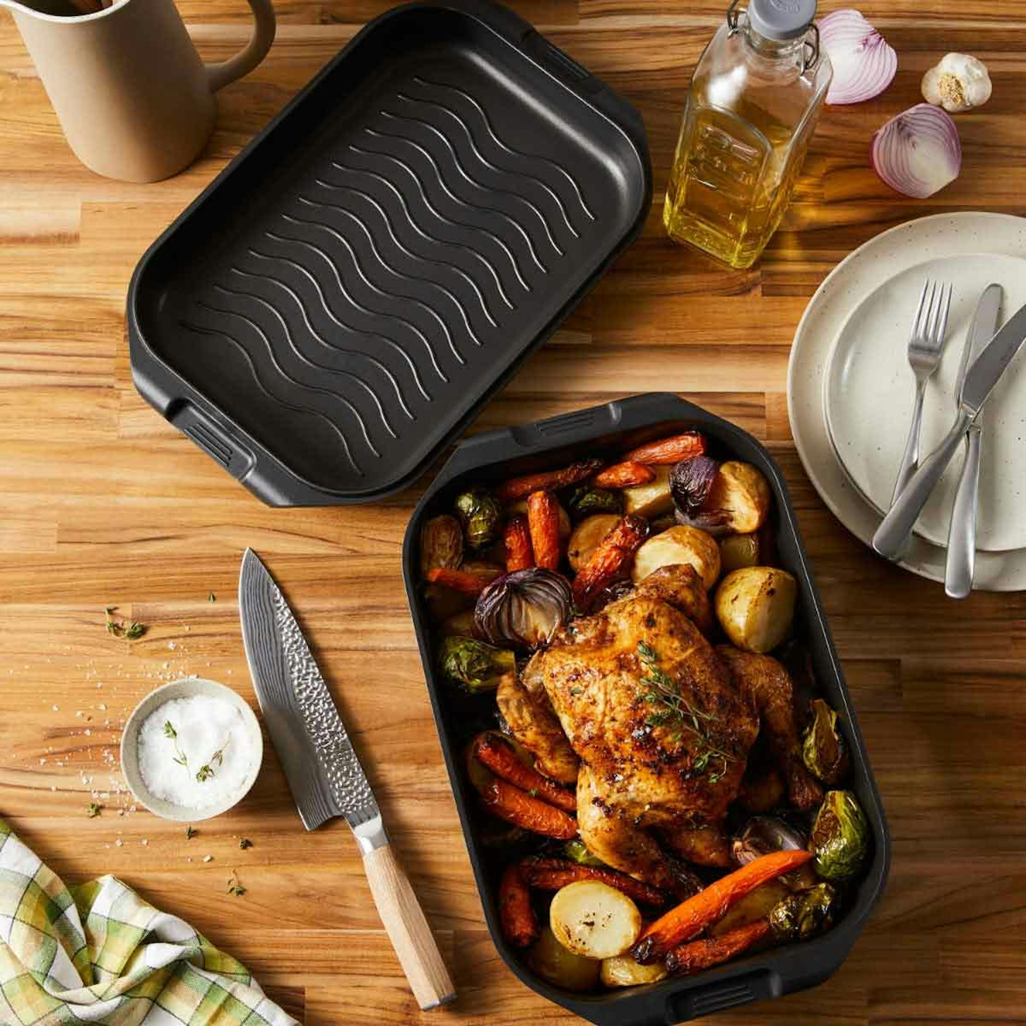 Roast chicken and vegetables on wooden bench - What's the difference between baking and roasting? Baccarat blog