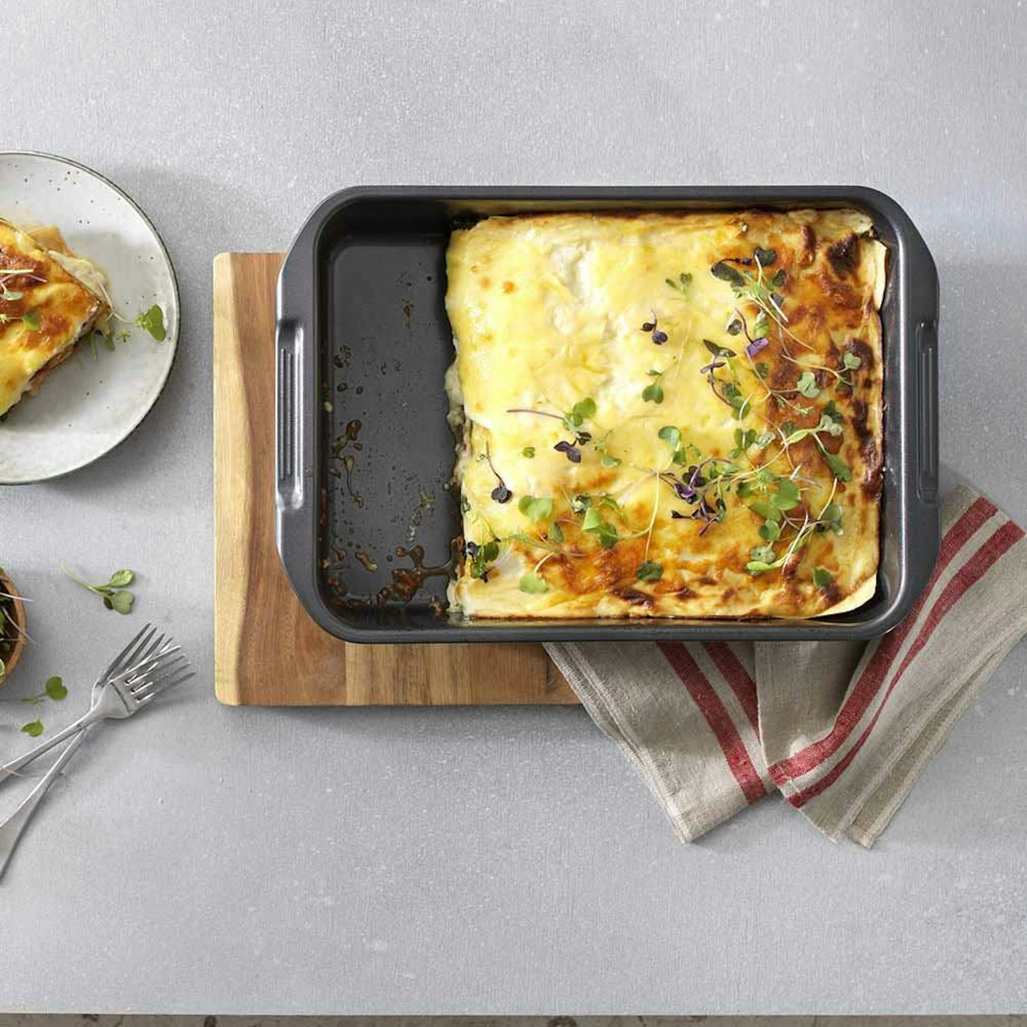 Sliced Lasagne in baking pan - What's the difference between baking and roasting? Baccarat blog