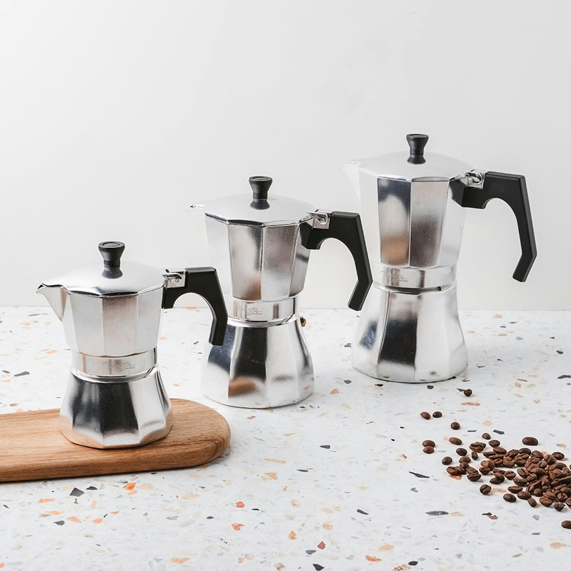 different sized stainless steel coffee makers