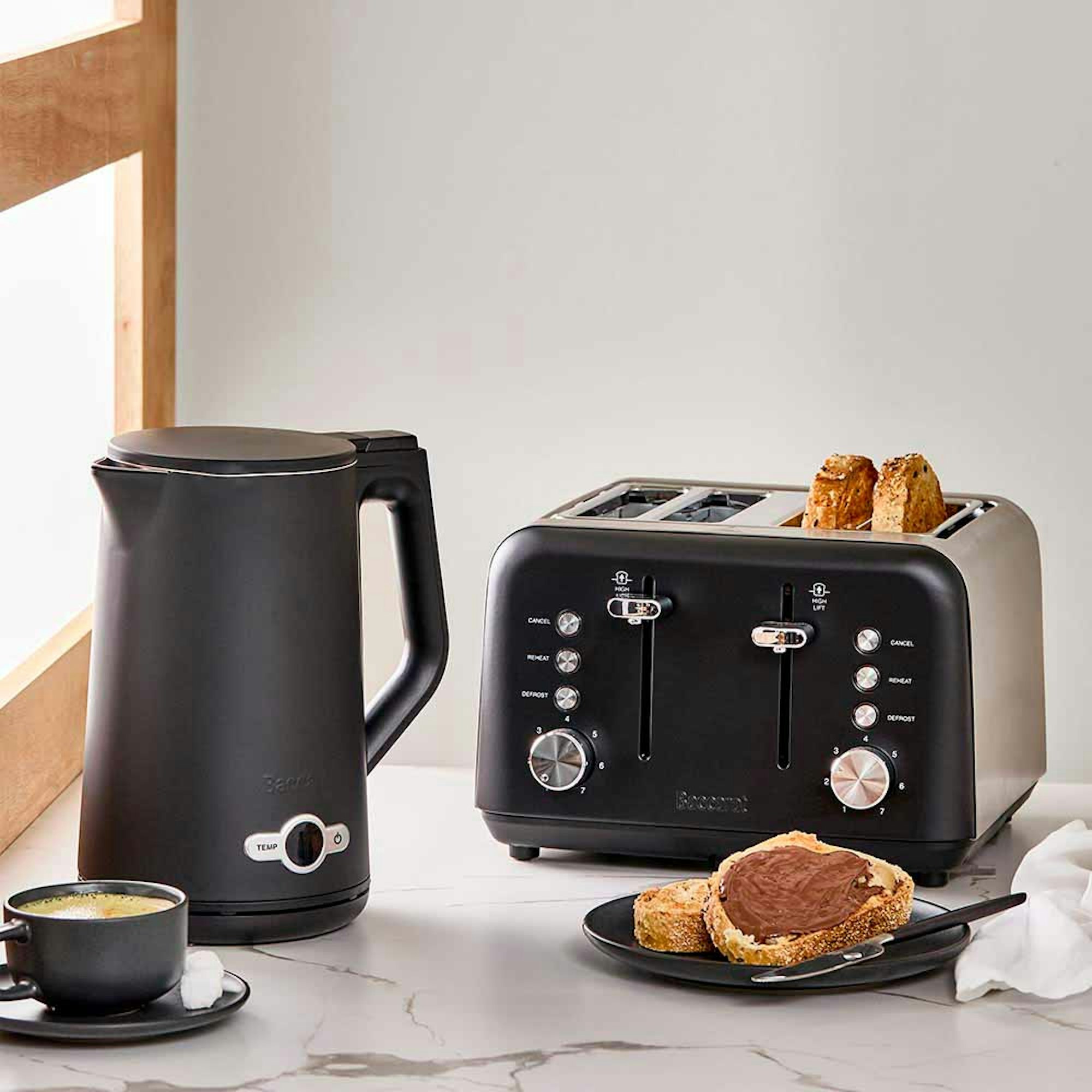 black kettle and black toaster on kitchen counter - Baccarat