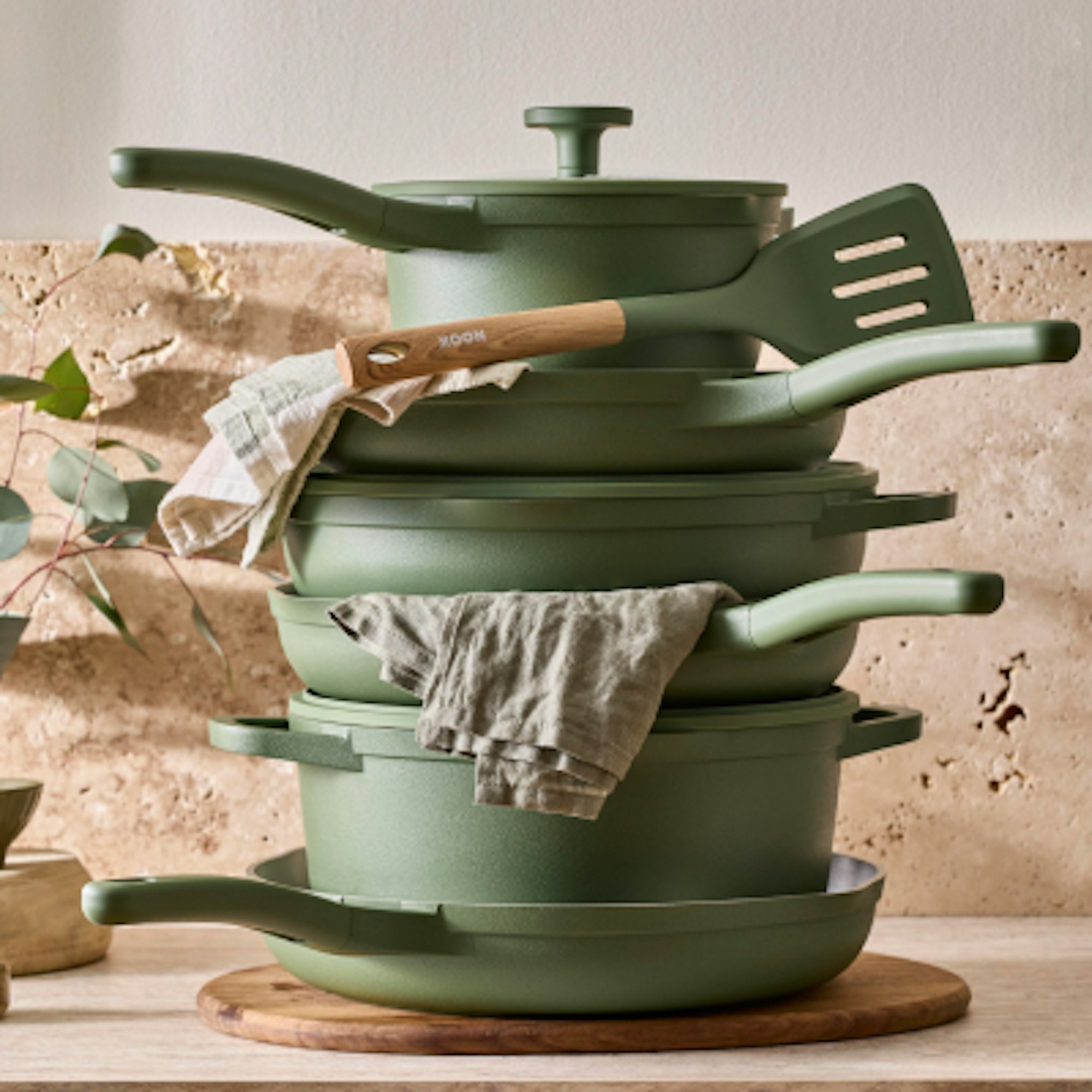 NOOK sage cookware in a stack