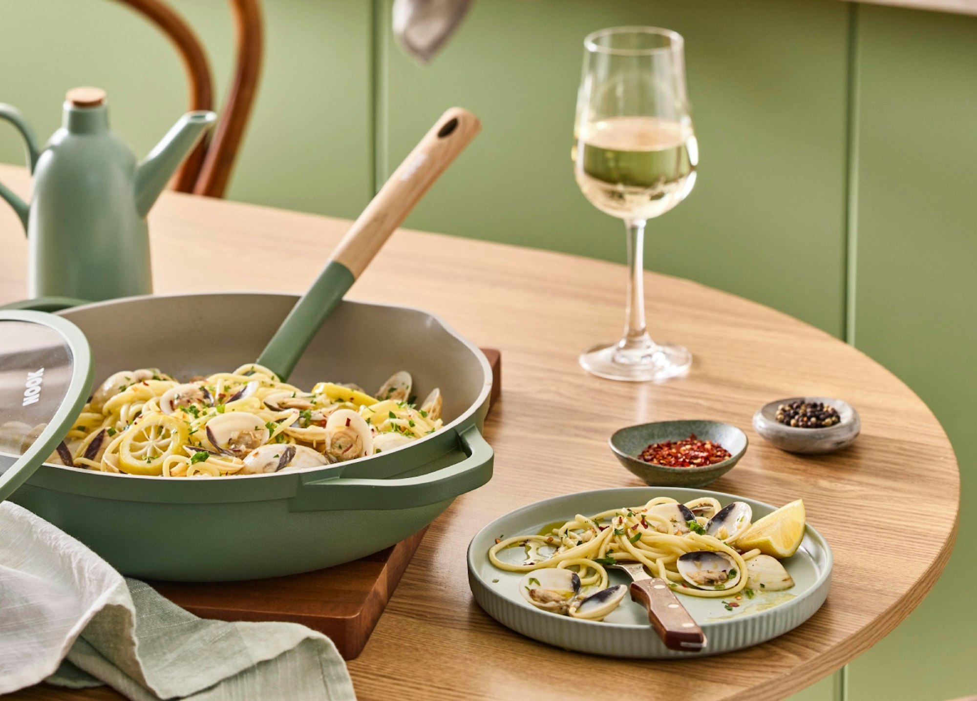 Nook Sage Saute Pan on a table with food