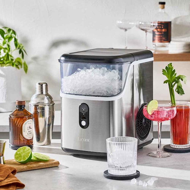 Baccarat ice maker on a benchtop with drinks