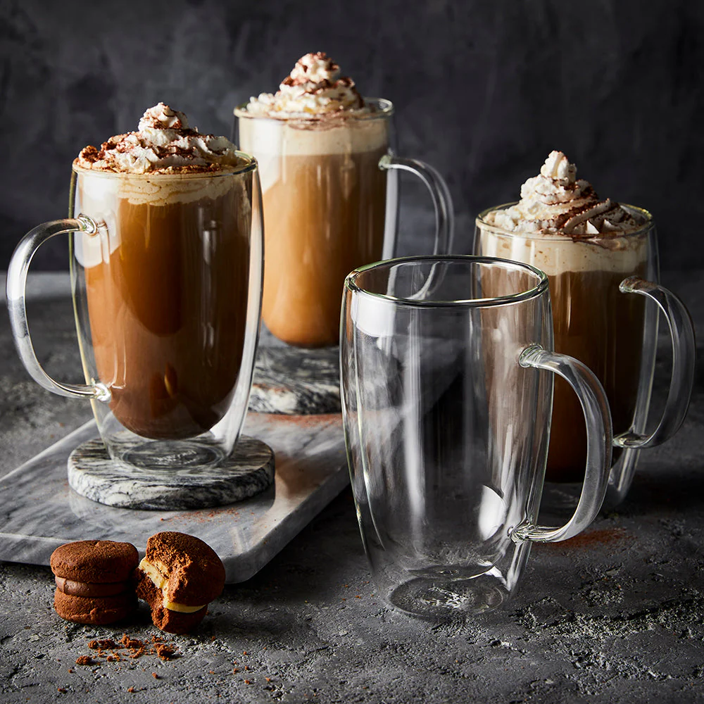 Baccarat Barista Coffee cups on a bench with coffee and cream drinks