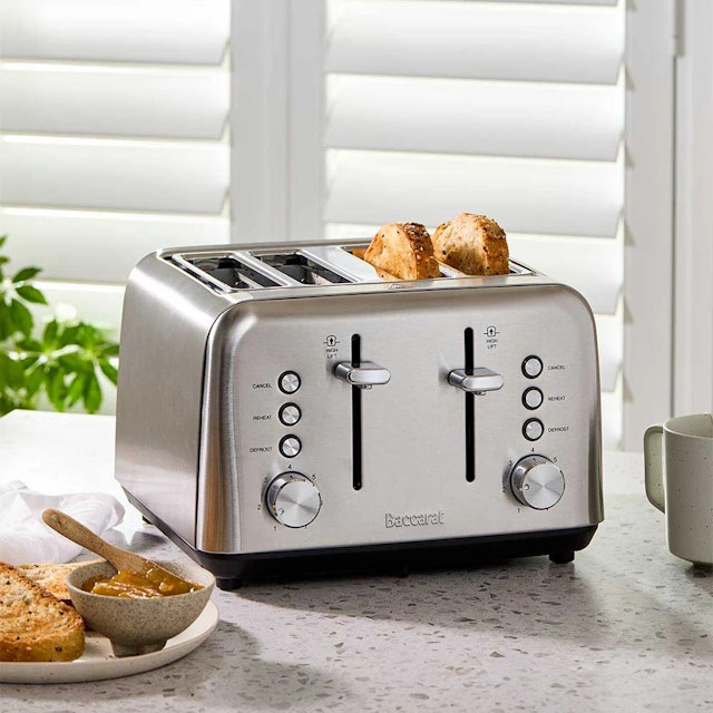 Silver four slice toaster on benchtop