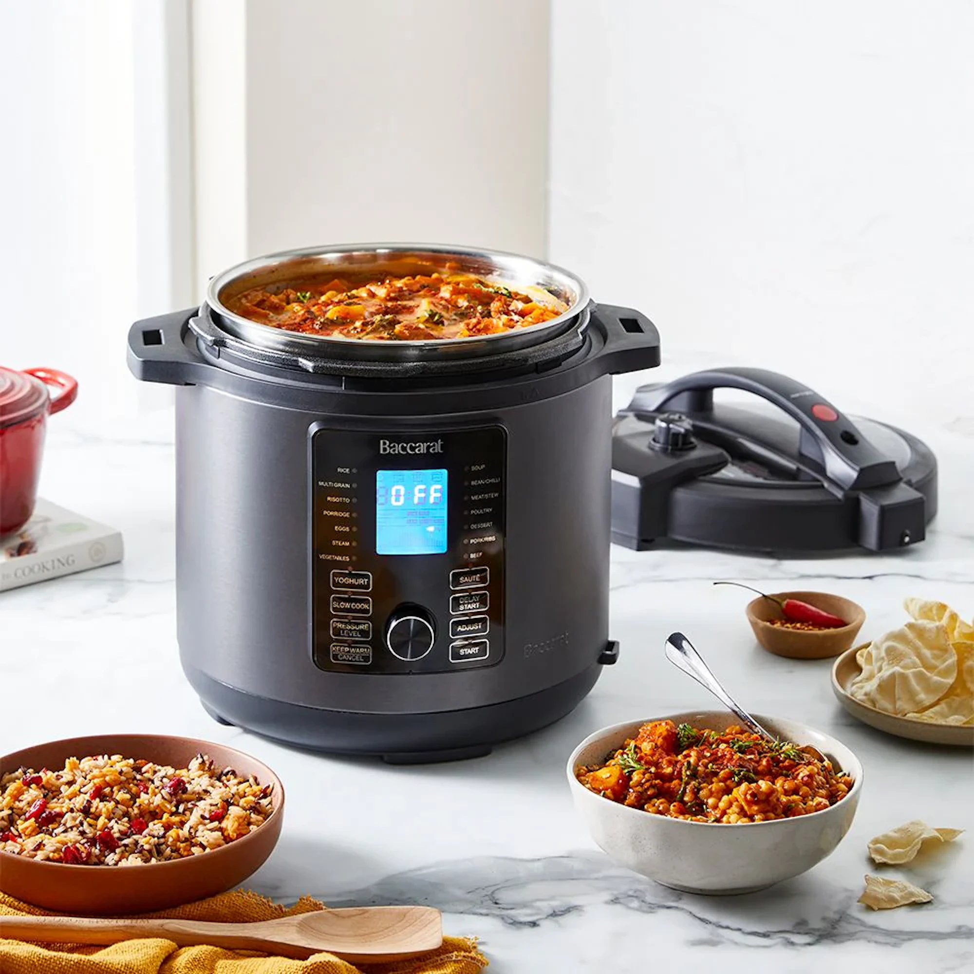 Baccarat Multi cooker on benchtop with bowl of food
