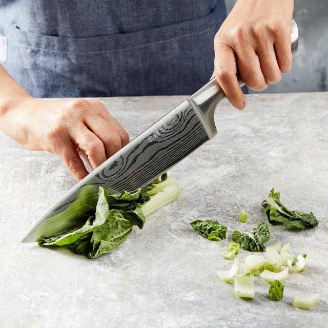 iD3 Chef's knife cutting vegetables