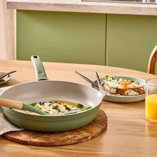 NOOK frypan on a table with food in it