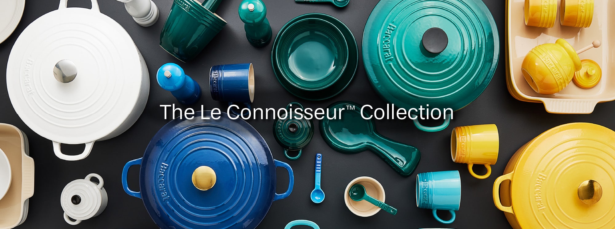Different coloured Baccarat Le Connoisseur bakeware range on table banner desktop