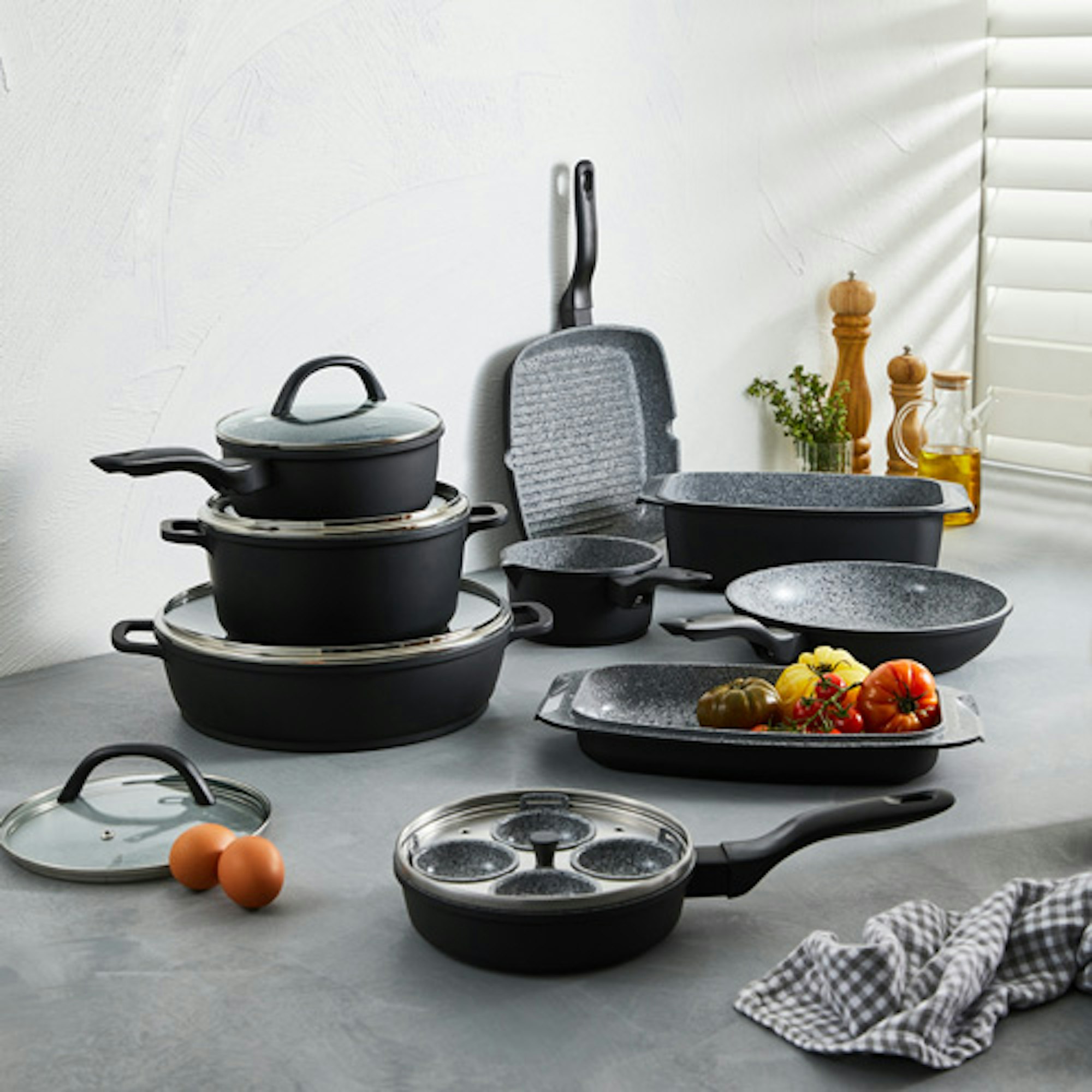 Stone cookware set with egg poacher