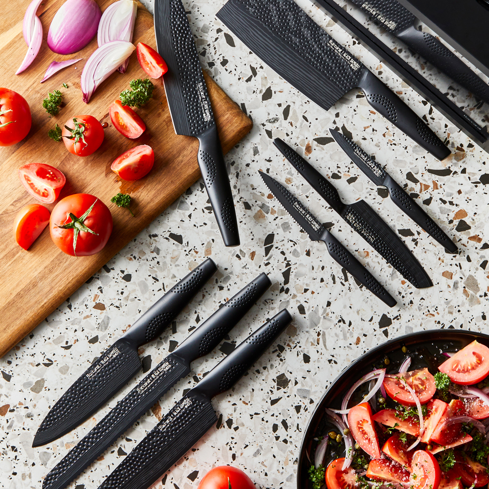 Black Baccarat knives on benchtop