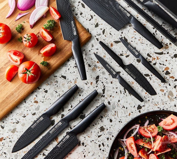 Black Baccarat knives on benchtop