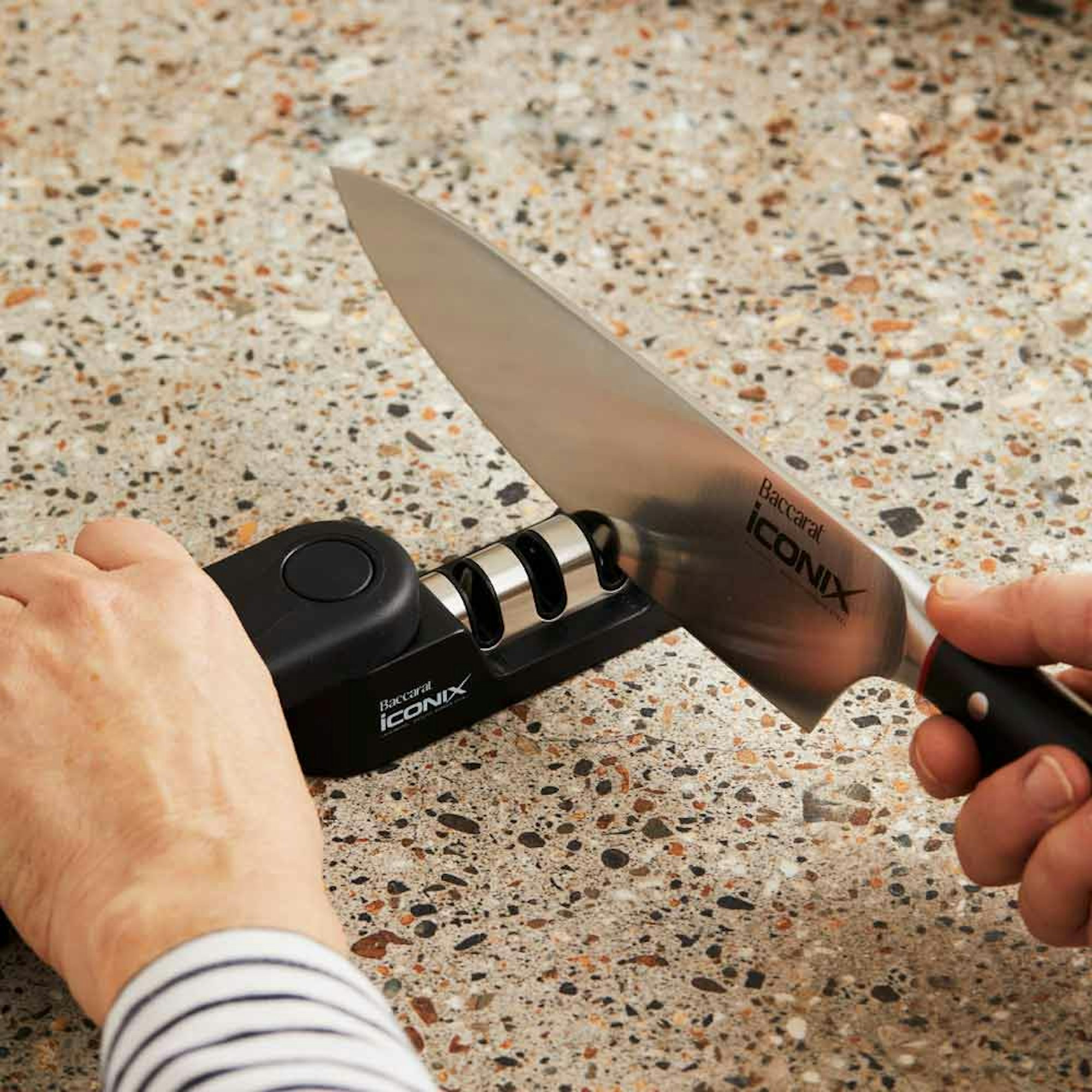 Woman sharpening a knife - How to Sharpen a Knife House Blog