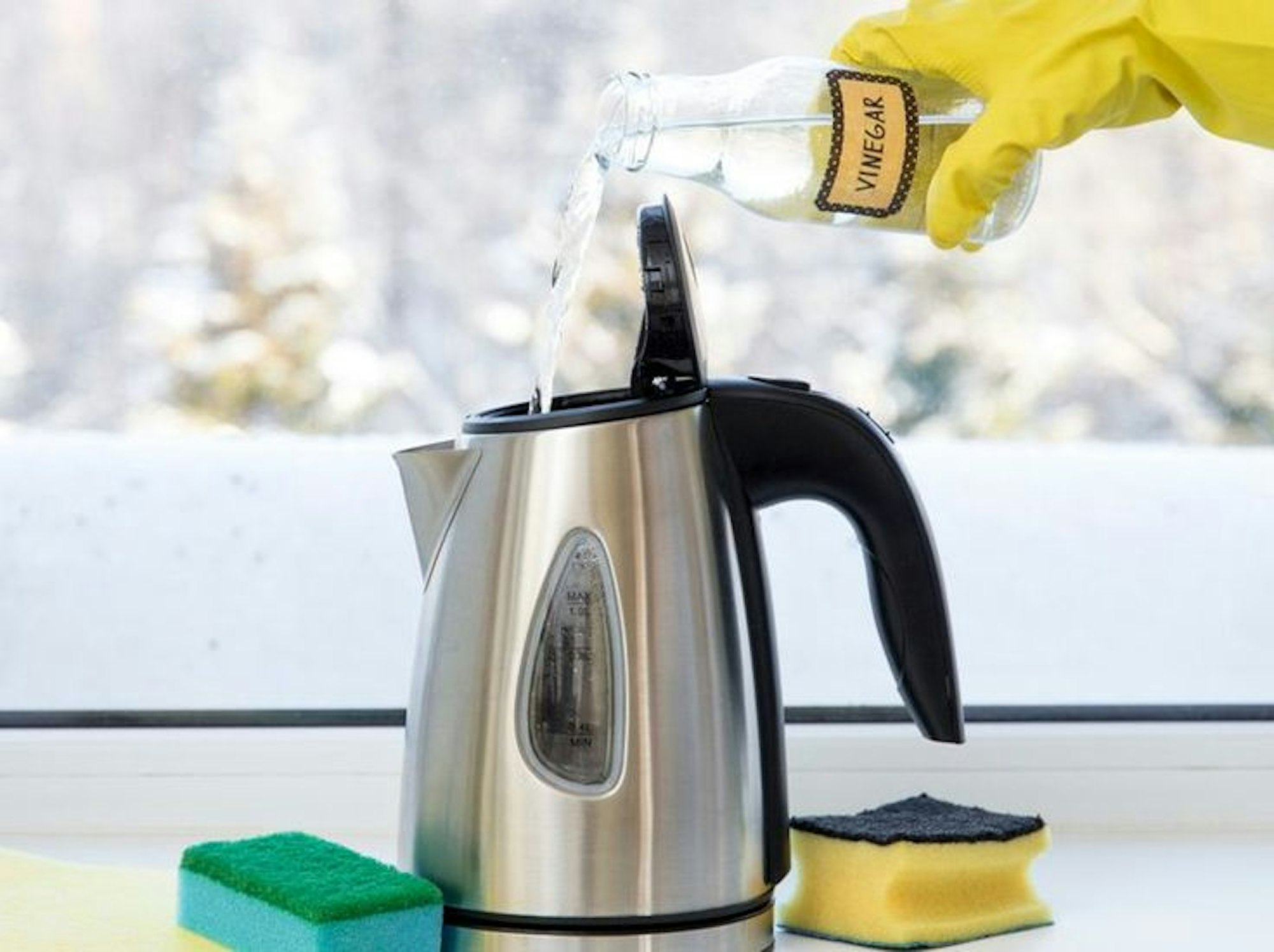 vinegar poured into kettle for cleaning - how to clean a kettle - House blog