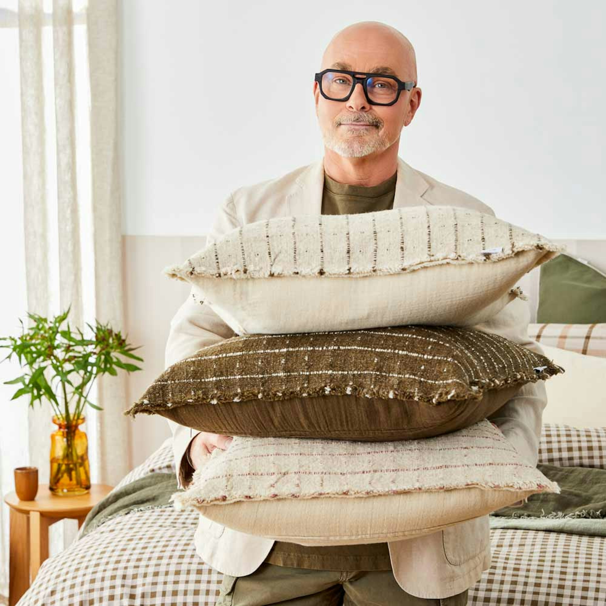 Neale Whitaker with Porto Cushion stack