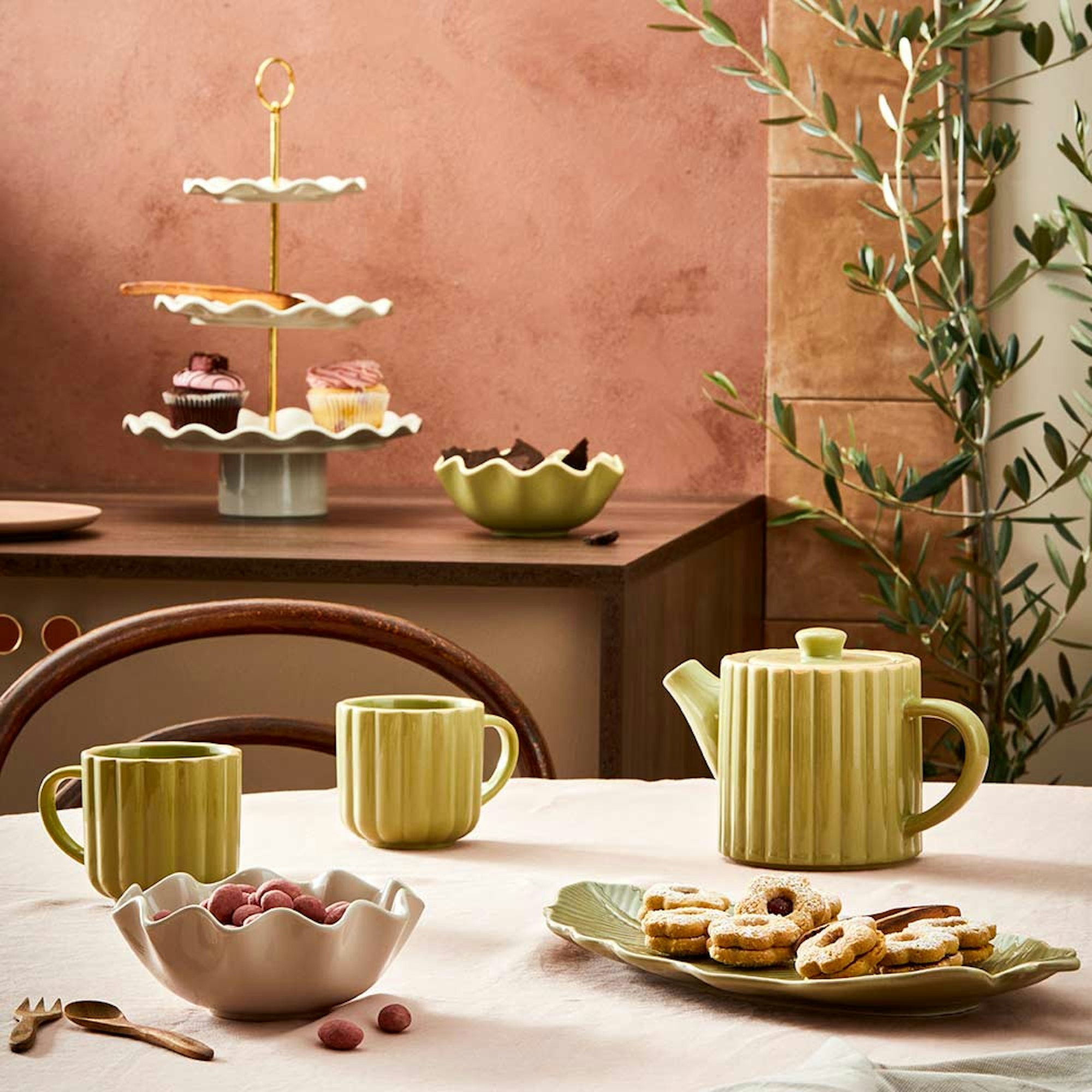 Alex Liddy Harley 3 tier cake stand. Mother's Day gift guide. High tea table setting with teapot, mugs, and 3 tier cake stand.
