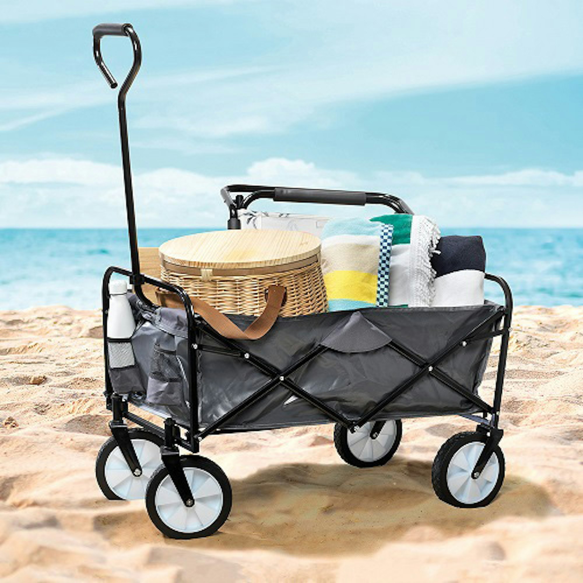 Beach trolley with picnic basket and beach essentials